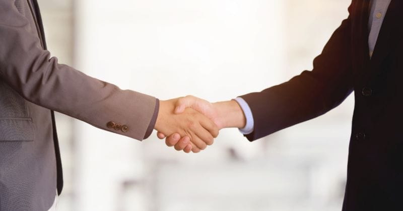 A Beginners Guide To SEO For Lawyers 3 two people shaking hands