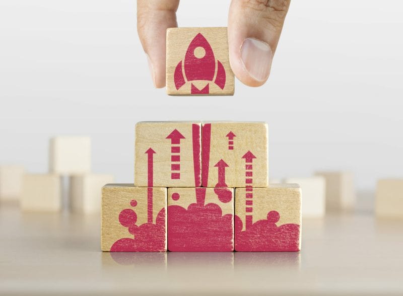 Email Marketing for Law Firms: 6 Proven Strategies to Get & Retain More Clients 2 assembling wooden blocks